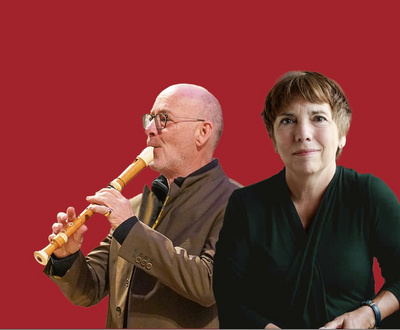 Margot Käßmann und Hans-Jürgen Hufeisen vor rotem Hintergrund
